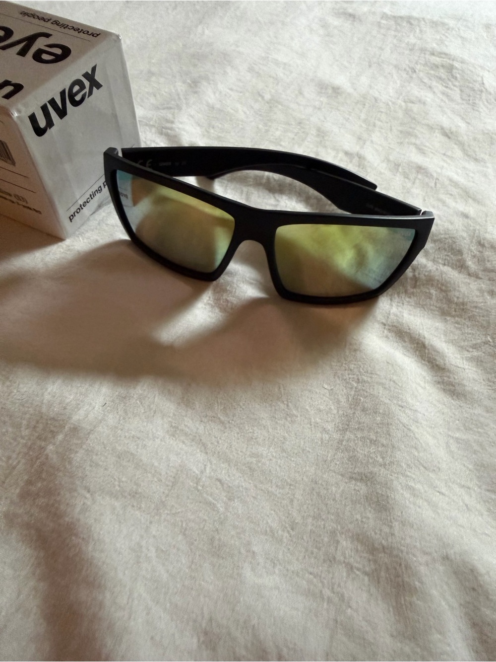 Uvex Black Matte Sunglasses with Yellow Mirror Lenses